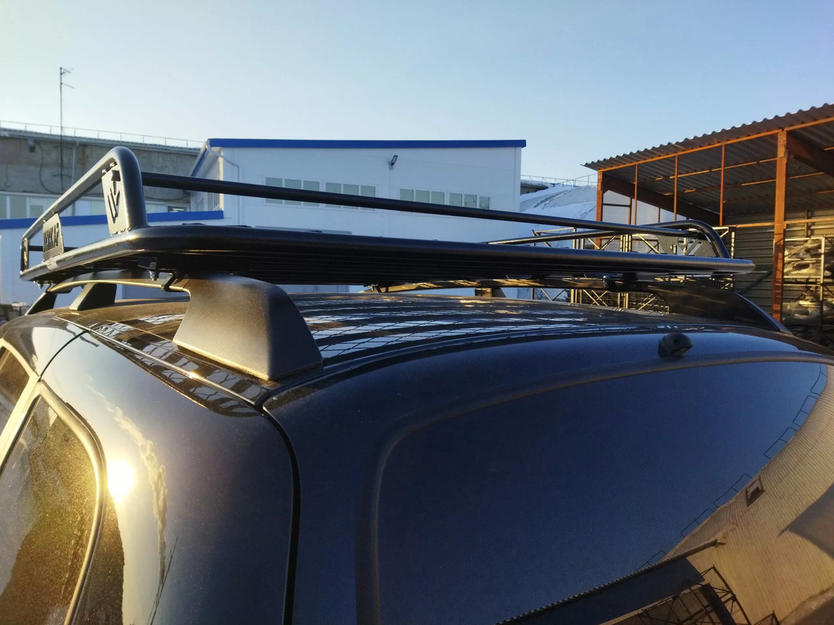 Багажник экспедиционный УНИКАР для ВАЗ-2123 Chevrolet Niva, LADA Niva Travel с ограждением и сеткой на рейлинги фото 3