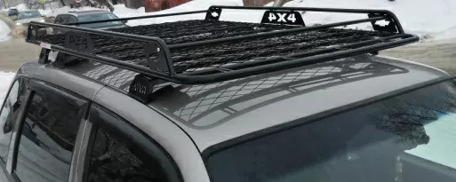 Багажник экспедиционный УНИКАР для ВАЗ-2123 Chevrolet Niva, LADA Niva Travel с ограждением и сеткой в штатные места фото 2