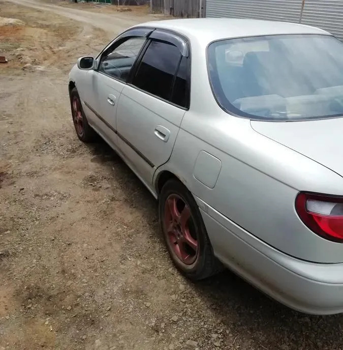 Дефлекторы Cobra Tuning для окон Toyota Carina T190 седан 1992-1996 фото 3