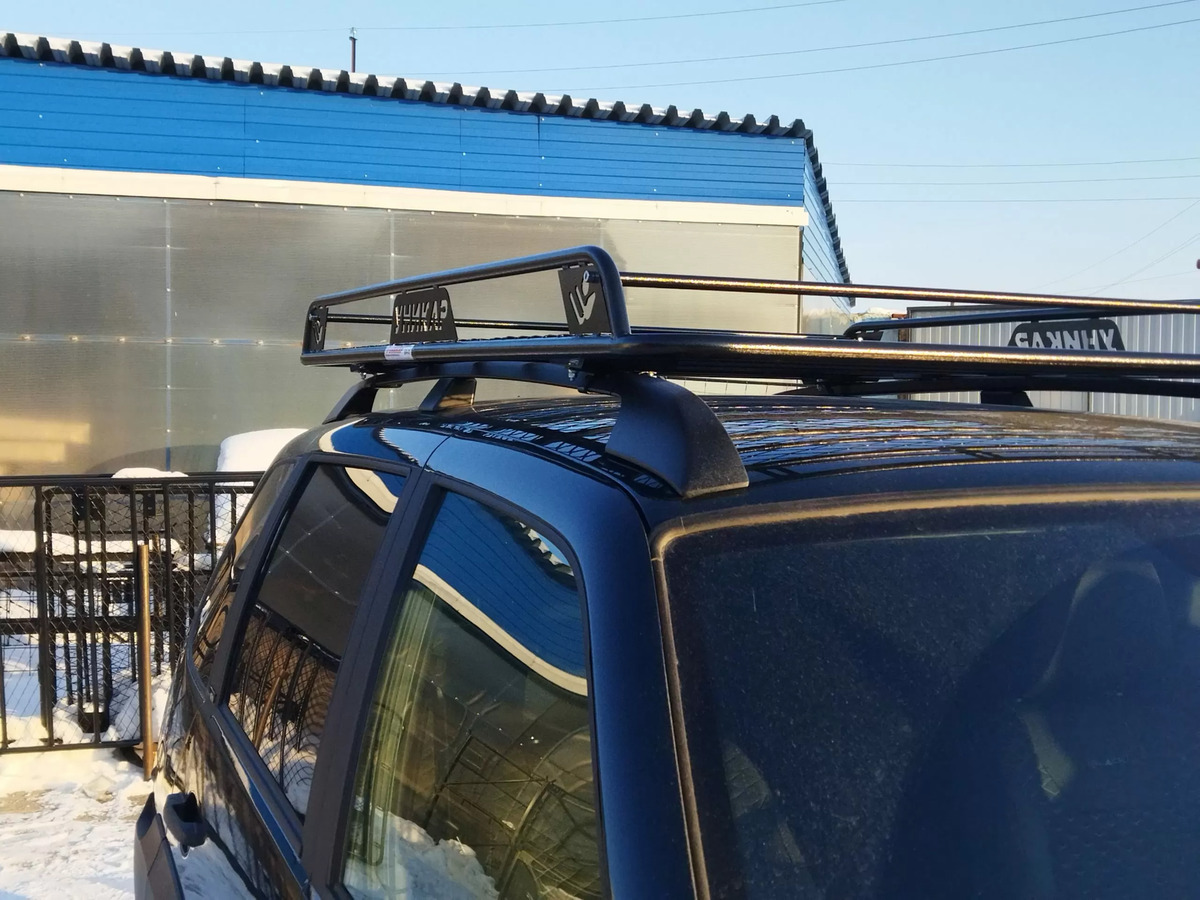 Багажник экспедиционный УНИКАР для ВАЗ-2123 Chevrolet Niva, LADA Niva Travel с ограждением и сеткой на рейлинги фото 2